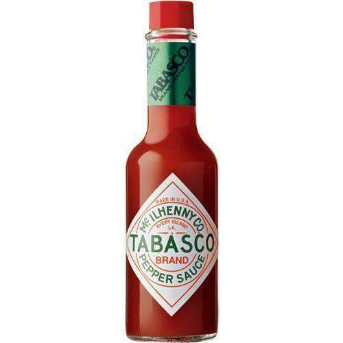 Tabasco Original Pepper Sauce in a glass bottle with white label with 57ml of sauce inside. Buy it online from What The Food