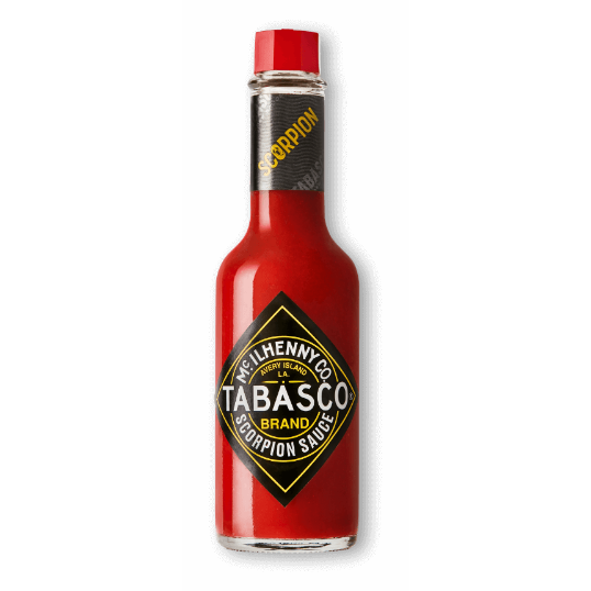 A 59ml glass bottle of Tabasco Scorpion pepper sauce with a black label and a picture of a scorpion. This sauce is available to buy from What The Food